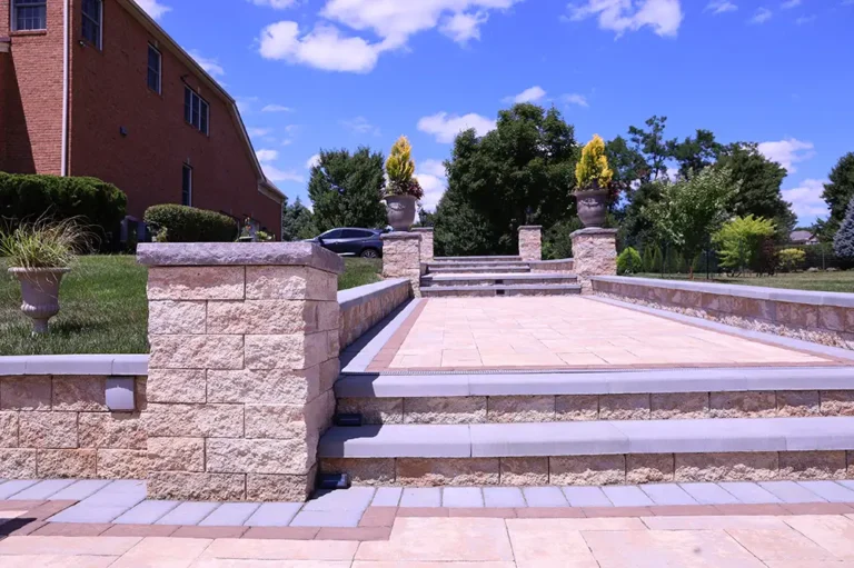 Elevated patio entrance with steps and custom columns — Silver Spring, MD