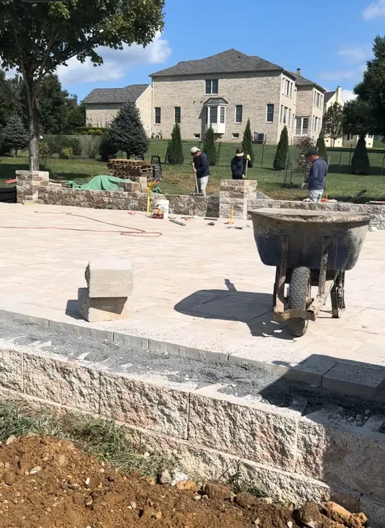 Ongoing patio construction with stone blocks and raised wall — Hardscaping in Silver Spring, MDlled under patio – Landscaping and Hardscaping in Silver Spring, MD