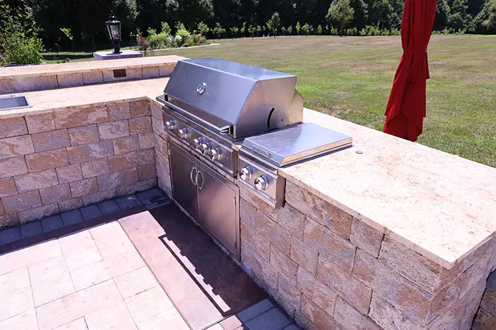 Professional outdoor grill station built with stone in Silver Spring, MD